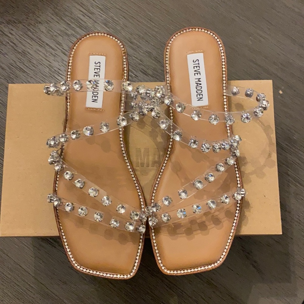 Brand new never worn Steve Madden clear flat sandals size 6